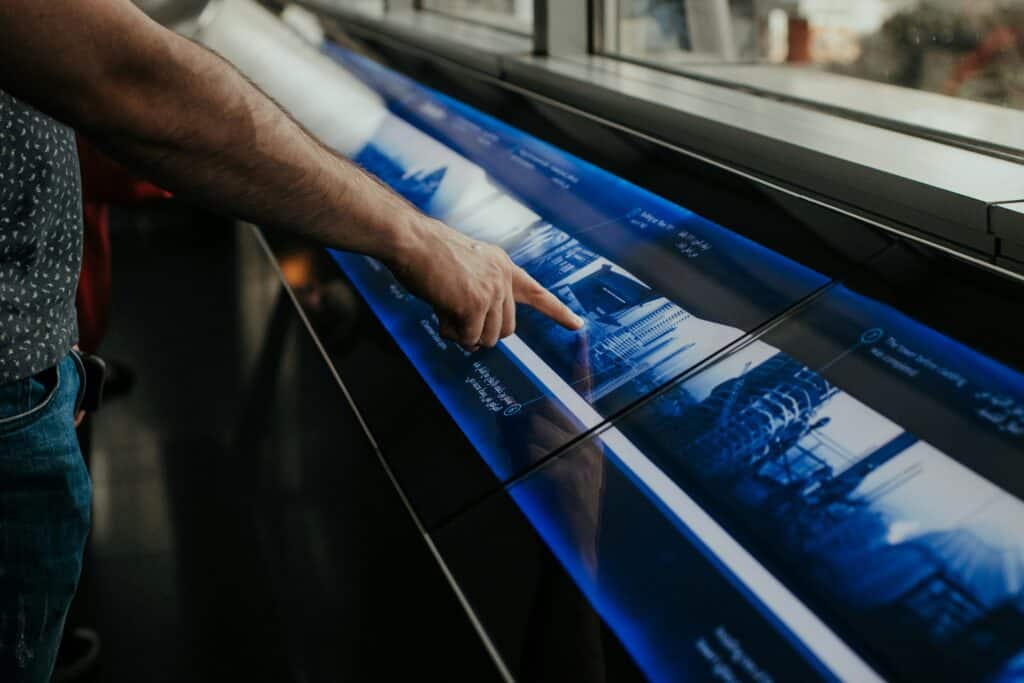 Touch screens being used by people