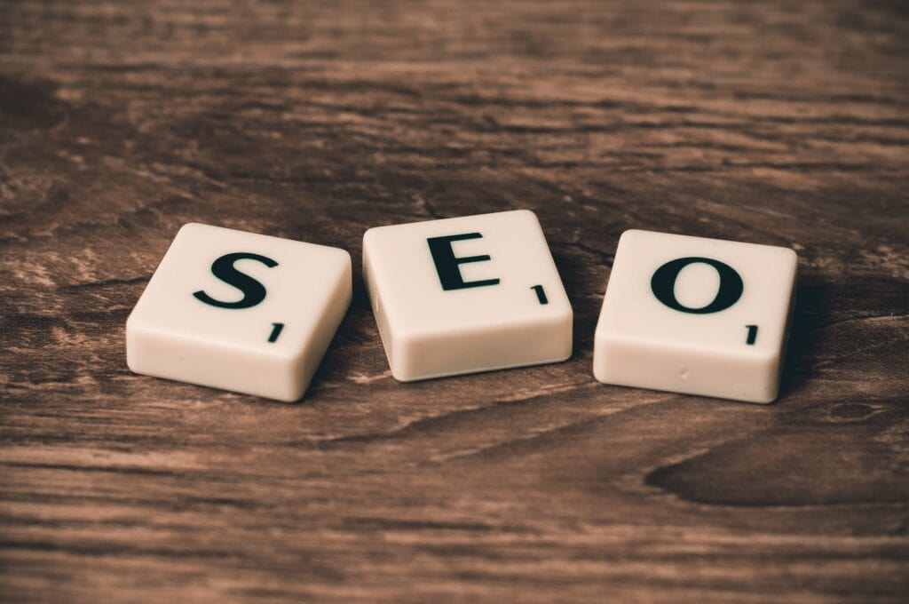 Scrabble letters spell out 'SEO'